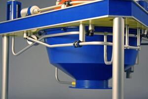 Propulsion system model close-up from below, showing blue conical tank, aluminum tubing and tube fittings under the deck