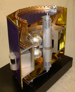Daughter satellite cutaway model showing foil-wrapped spherical tanks, central boom canister and copper top ring