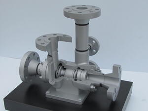 Pump cutaway model on black base with sectioned casing showing impellers, shaft and flanged inlet and outlet ports