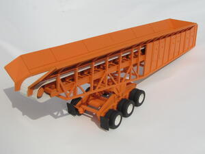 Mobile conveyor trailer model with orange hopper, truss frame, white belt and triple-axle wheels, three-quarter view