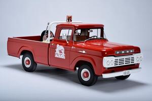 Ford F100 truck scale model by KiwiMill, front three-quarter view in red with white grille, bumper and roof beacon