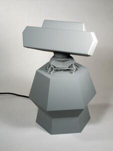 SMART-S Mk2 radar model with its antenna turned broadside atop a gray hexagonal pedestal, power cord trailing behind