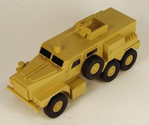 Desert tan armored vehicle model from a high front angle, showing the hood, windshield and open roof gun turret