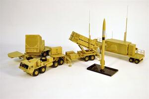 Patriot missile launcher model set with radar, launcher, control shelter trailer and missile on a black stand