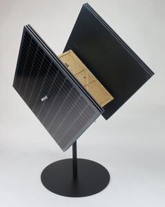 Meteorite satellite model on a black pedestal stand, solar panel wing angled forward with gold top plate behind