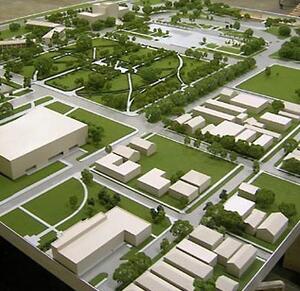 Baton Rouge architectural site model seen from above, with white building blocks, green lawns, trees and a street grid
