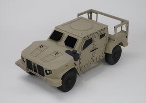 1/12 scale JLTV model in desert tan, front three-quarter view from above showing hood vents, roof hatch and cargo bed