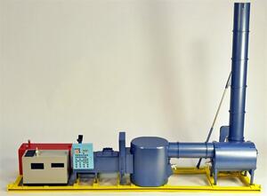 Industrial incinerator scale model side view with tall blue chimney raised, red tank and control panel on yellow skid