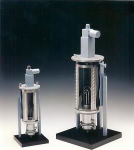 Two mixing tank models of different sizes with clear vessels showing internal agitator, top drive and stands on black bases