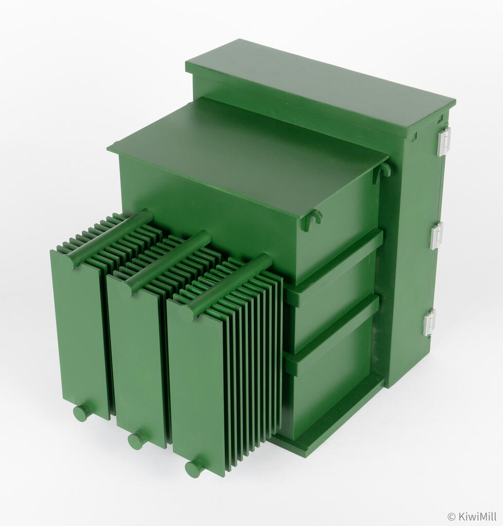 High-angle rear view of transformer model showing three corrugated radiator banks attached to the green tank