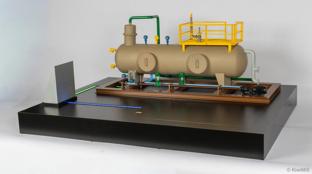 Separator skid model angled view from the left showing vessel nozzles, overhead green piping and transmitters
