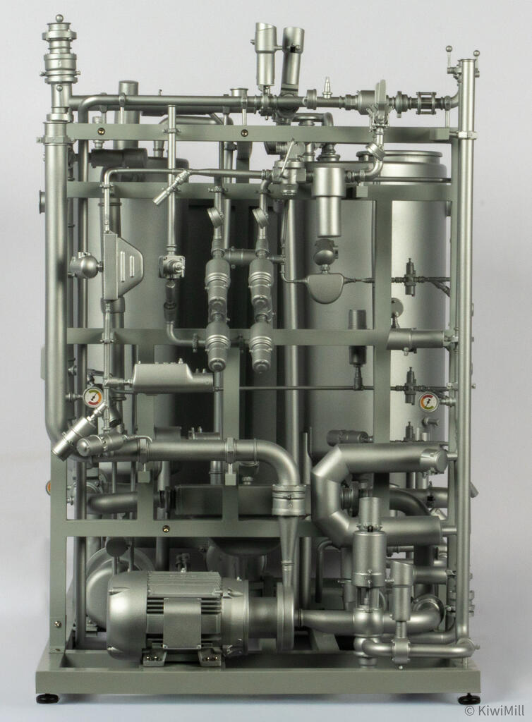 Straight-on end elevation of the valve rack with paired actuators, gauges, pipe bends and finned pump motor