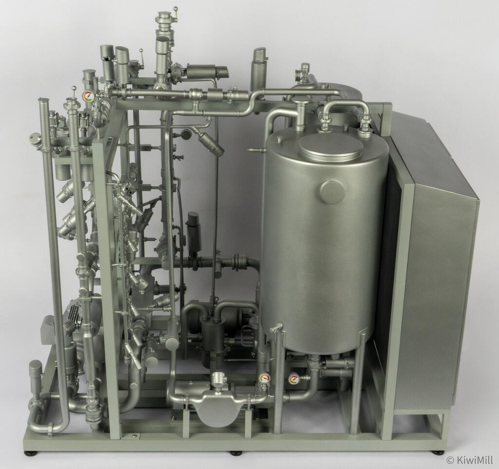 Blending skid model seen from above at an angle, showing the process tank lid, side manway and upper piping runs